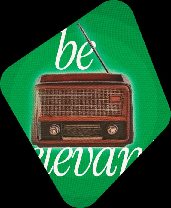 Vintage radio over a green "be brave" backdrop